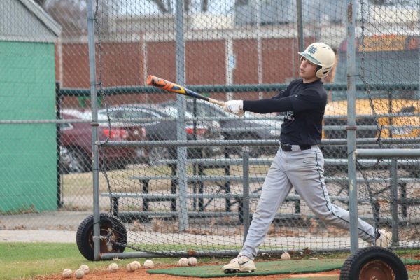 Cooper Wade (9) practices batting during afterschool baseball practice. Cooper Wade hopes to play in college and professionally. 