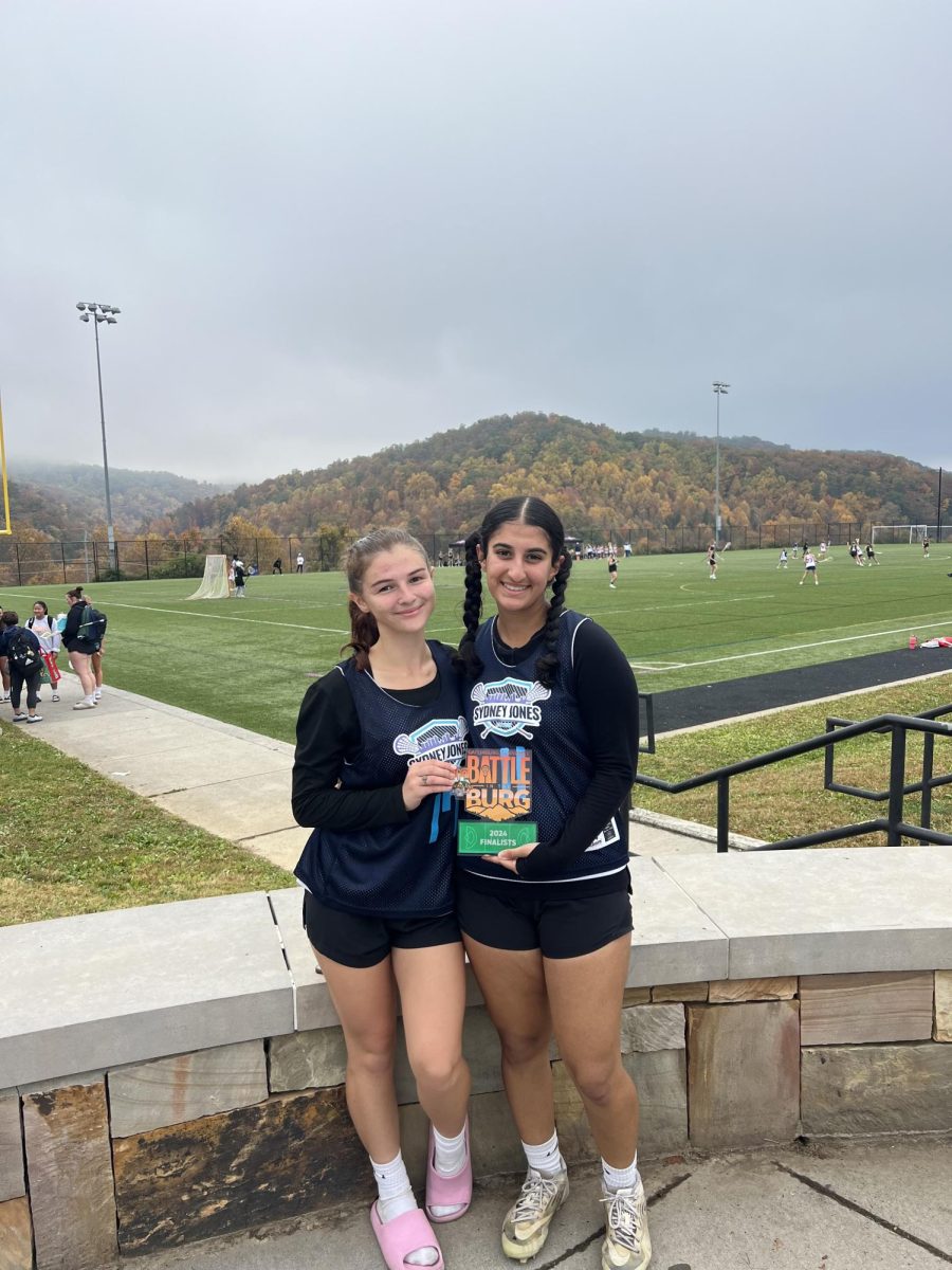 (From right to left) Kaitlyn Card (11) and Hannah Yaghini (11) pose for a picture after winning 2nd place in the Battle of the Burg. This tournament was held in Gatlinburg, Tennessee. 