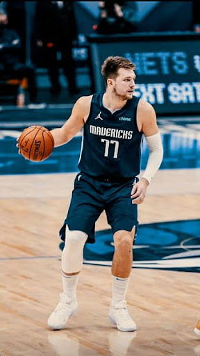 Luka Doncic dribbles the ball while playing for the Dallas Mavericks. He was later unexpectedly traded to the Los Angeles Lakers.